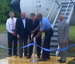 Houston Congressman Ted Poe helps Houston Police Chief Charles McClelland cut the ribbon to the HPD's newest training tool