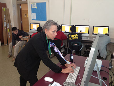 counselor Danette-Maldonado checking computer