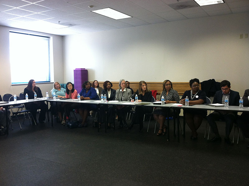 panel sitting around table