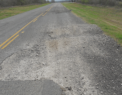 Large-hole-on-FM-road-in-Karnes-County400px-310px-tn.png