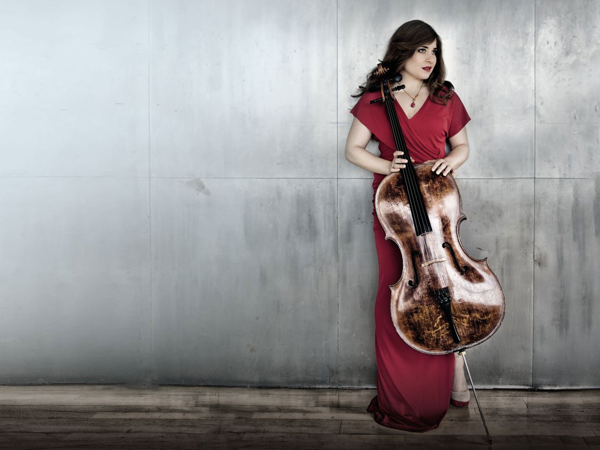 Cellist Alisa Weilerstein posing with cello