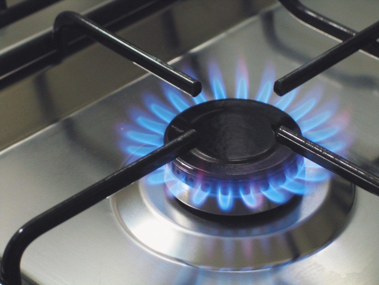 Blue flame on stovetop