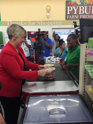 Houston Mayor Annise Parker purchases Blue Bell ice cream at a grocery store on Scott Street.