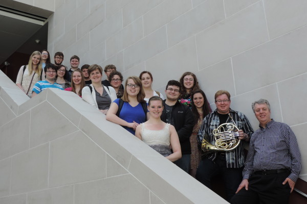 Horn professor William VerMeulen poses with a group of music students from the Eastman School of Music