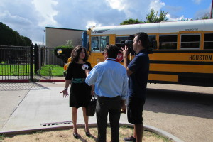 HISD Trustee Juliet Stipeche talks to reporters outside Furr High School about the bus crash that killed two students.
