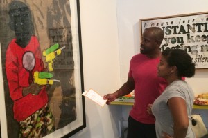Picture of couple looking at art