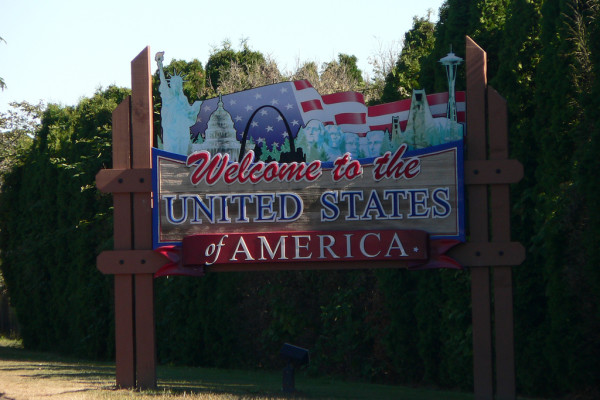 sign reads, welcome to the United States of America