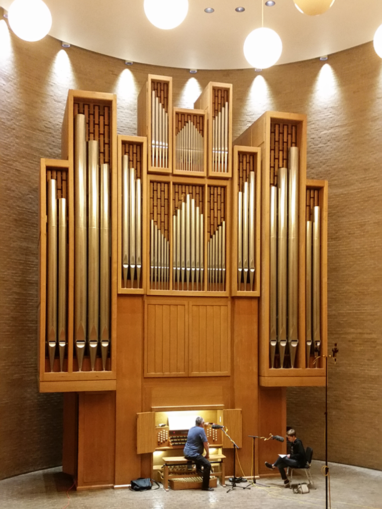 Keith Weber and Dacia Clay. Regular-sized people, giant Beckerath organ.