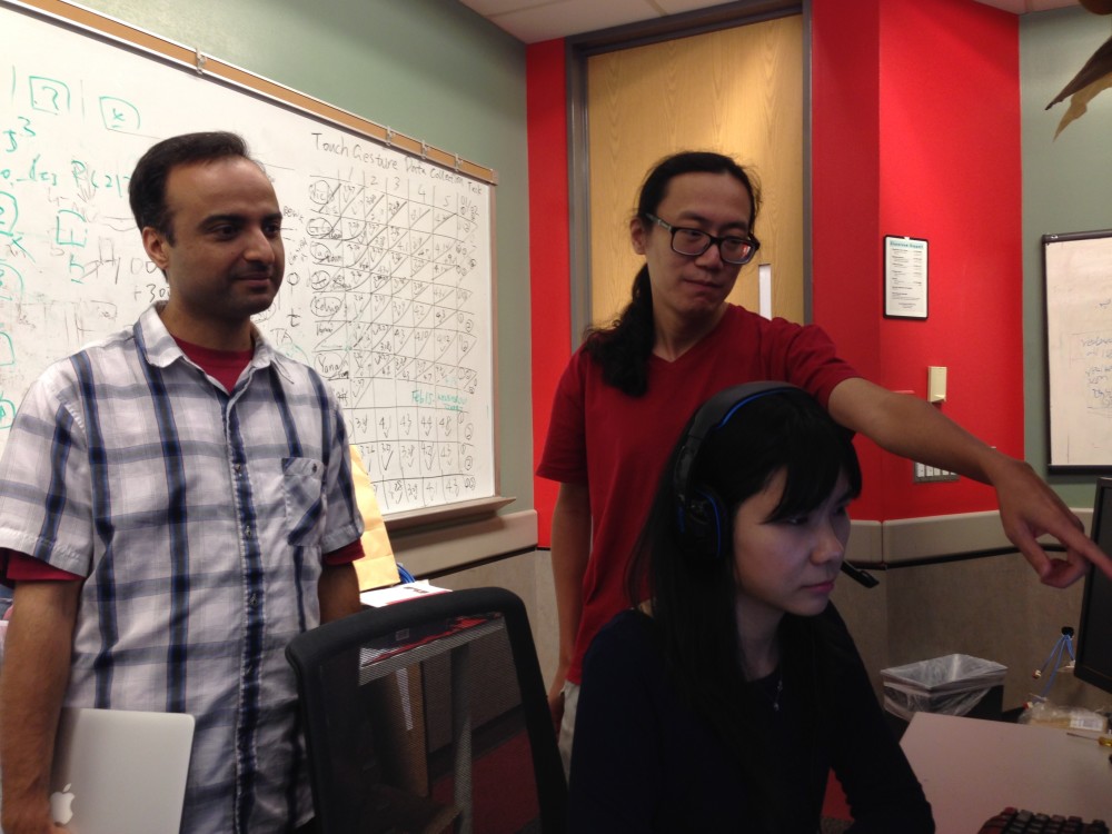 Professors Omprakash Gnawali and Larry Shi work at their lab in the University of Houston.