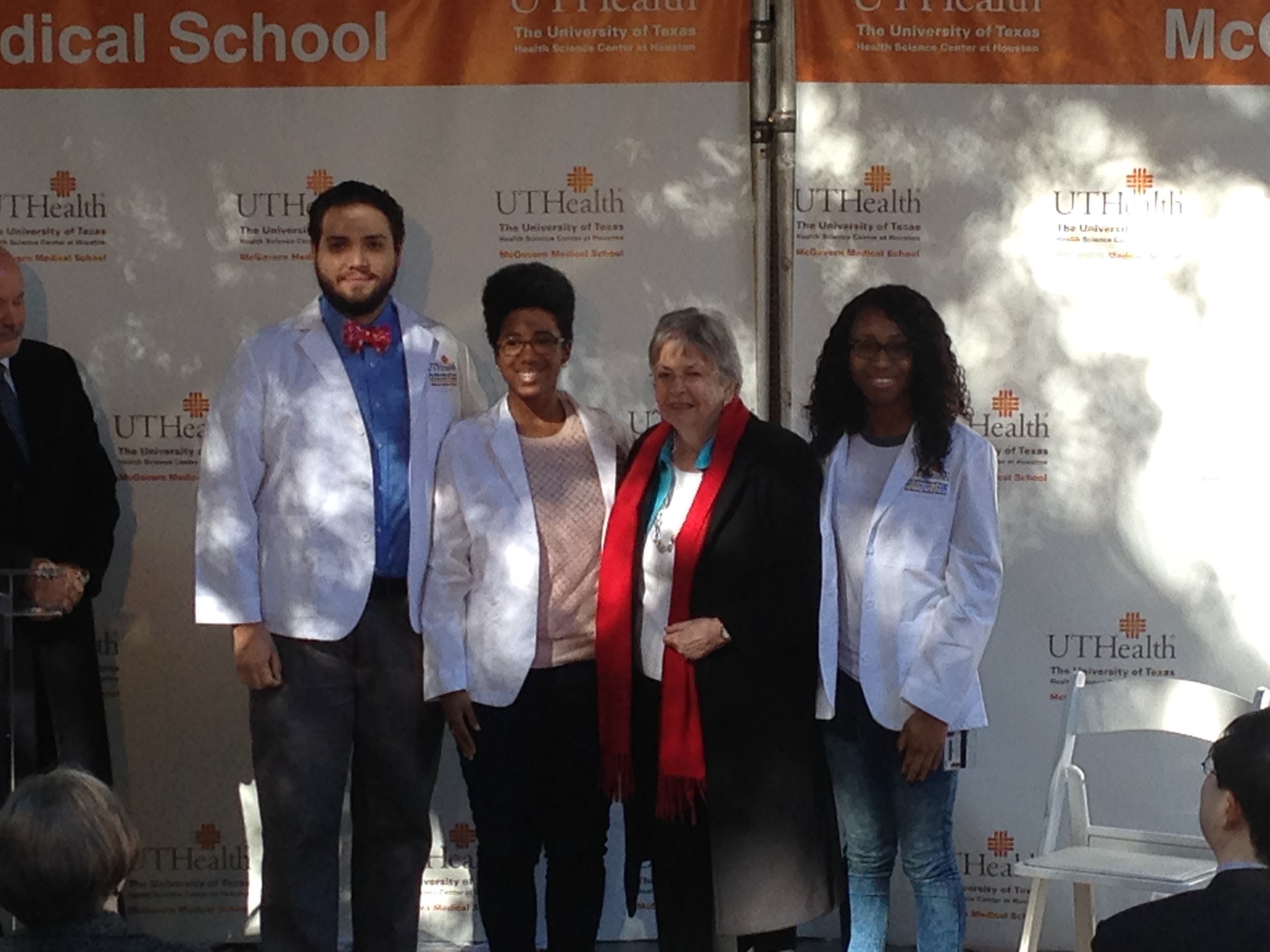 Kathrine G. McGovern, widow of Dr. John P. McGovern, poses with three students from the UT Health Science at Houston during the event where the donation was announced.