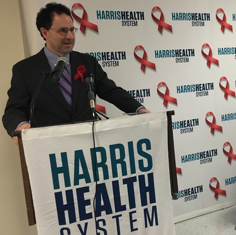 Dr. Ben Barnett is the associate medical director of HIV Services at Harris Health. He is speaking during a World Aids Day event at the Thomas Street Health Center.