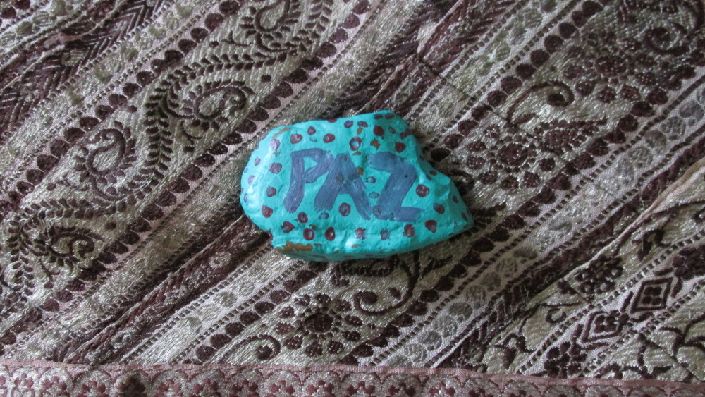 Students and teachers use a painted stone as a talking piece.