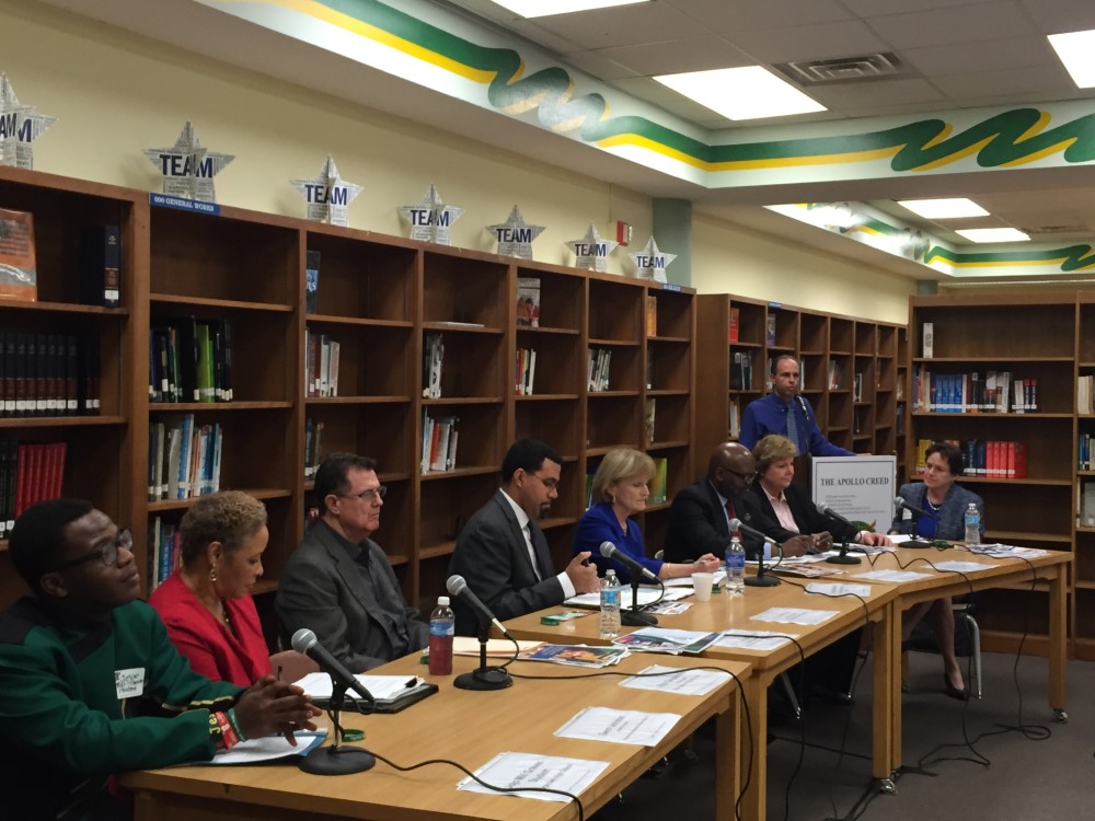 School leaders, community members and students gather at a round table discussion about healthy communities at Sharpstown High School