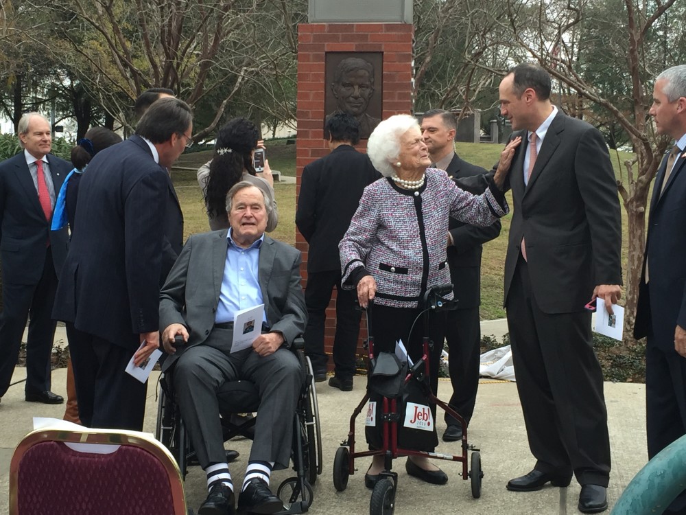 Former President George H.W. Bush and First Lady Barbara Bush greet visitors at the dedication ceremony in Houston.