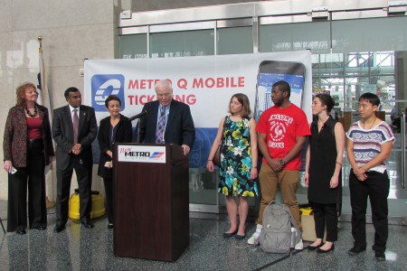 Metro Board Member Jim Robinson is joined by transit officials and beta testers as he announces the new mobile ticketing app.