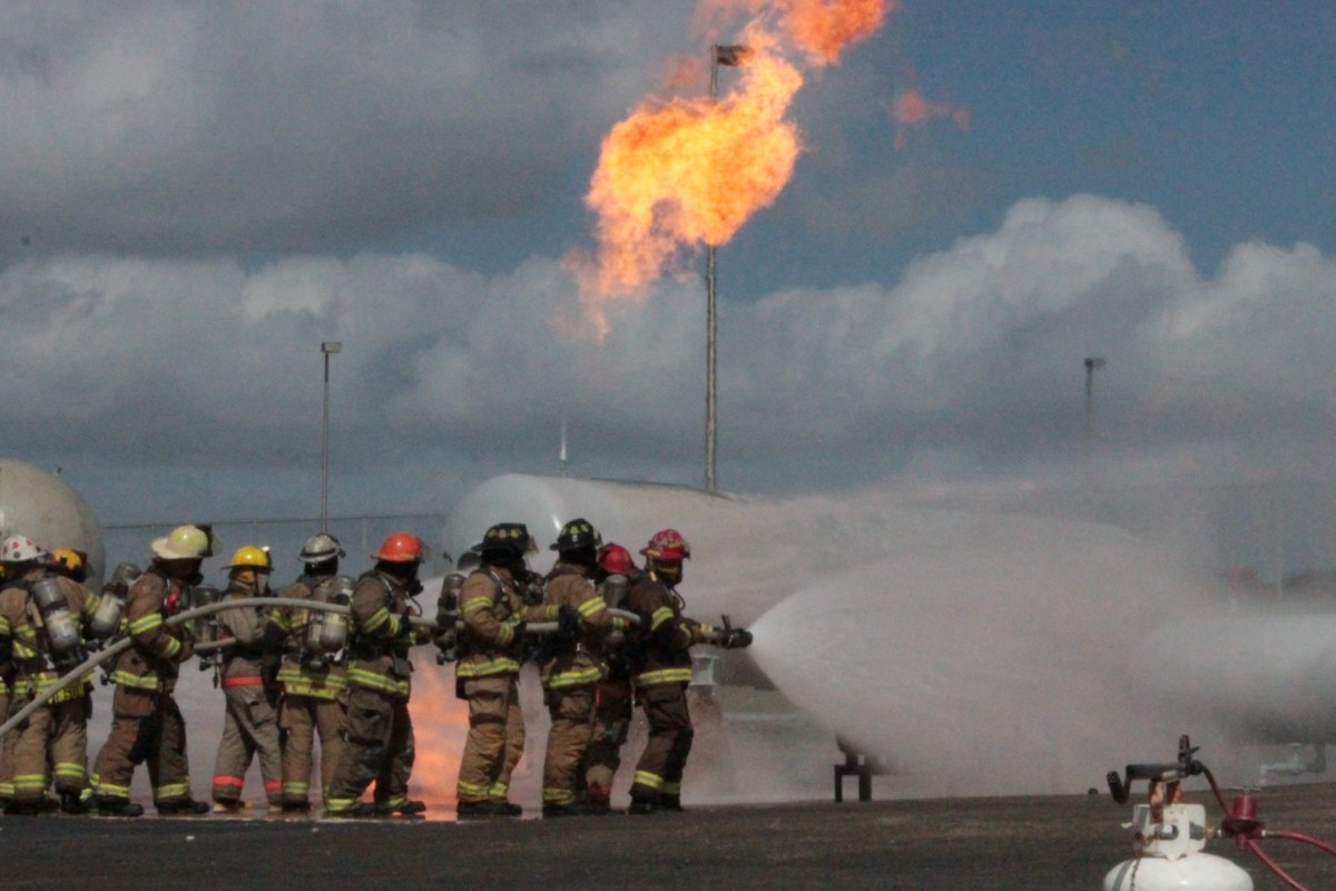 Volunteer firefighters training at Texas A&M's Disaster City in College Station