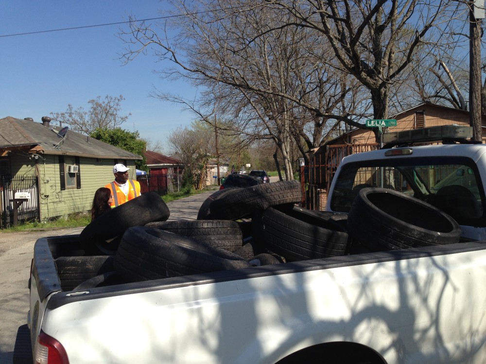The city's crews remove tires that can also hold water.