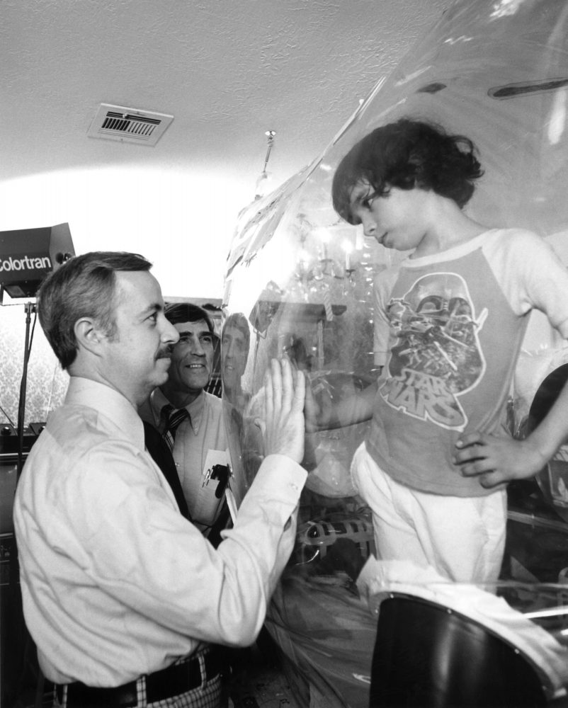 David Vetter being introduced to his new pediatric immunologist, Dr. William Shearer, in 1979. (Photo Credit: Texas Children's Hospital )