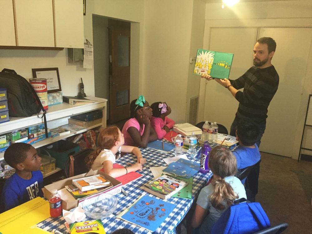 Teacher Sam Brower leads a class at an alternative learning environment for students who are not taking the state standardized exams this week. Brower said that his lesson tries to teach about discrimination through a Dr. Seuss book.