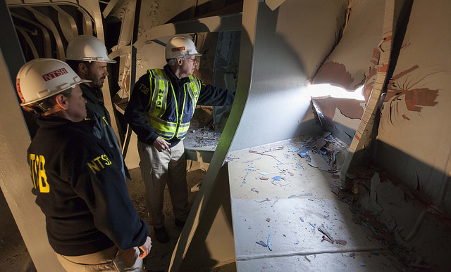 NTSB Board Member Earl Weener joined by (Director of Marine Safety) Tracy Murrell and Eric Stolzenberg (Investigator In Charge), view damage to bow of the M/V Conti Peridot
