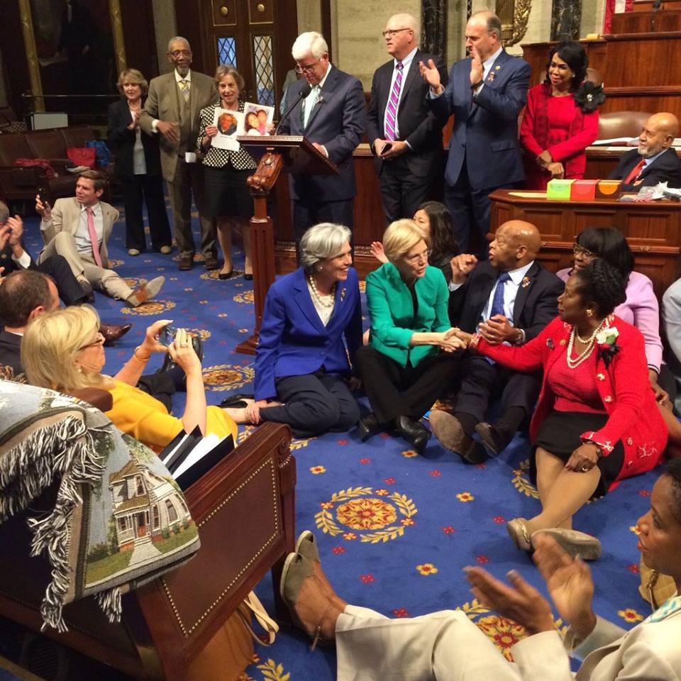 Houston Democrats siting on the floor