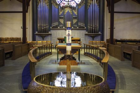 The Baptismal Font at Christ the King Lutheran Church with organ in the background. One of the venues for the convention.
