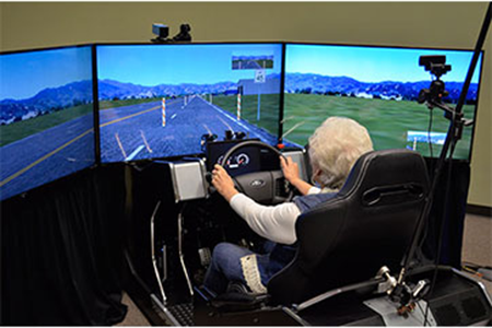 WEB-caption-Volunteer-study-subject-driving-simulator