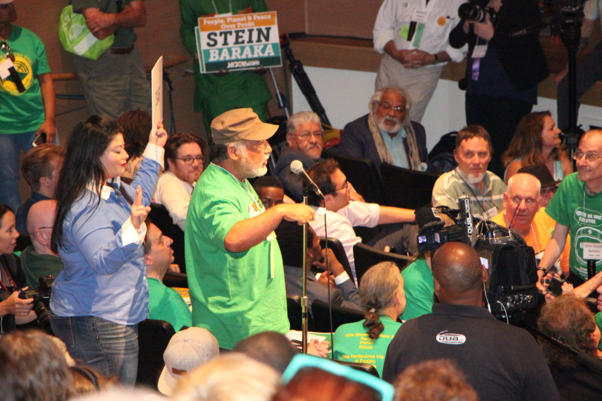 Delegate Herb Gonzales (at microphone) of San Antonio casts Texas' votes at the Green Party presidential nominating convention at the University of Houston. (Photo: Andrew Schneider, Houston Public Media)