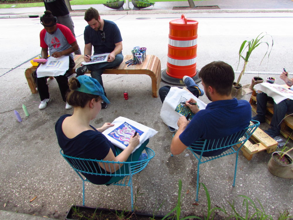 A parking space transformed into an art studio.
