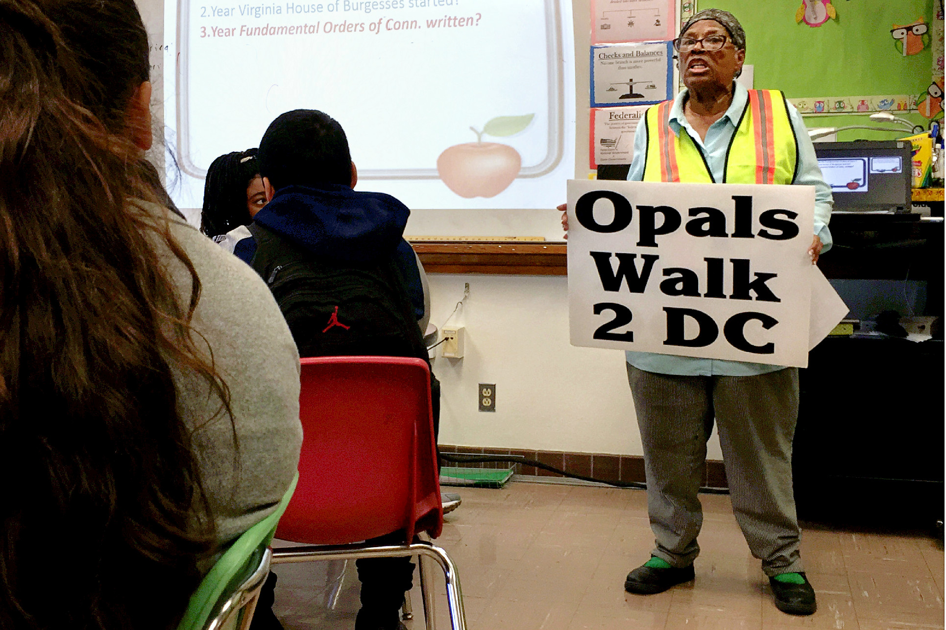Opal Lee addresses students at E.B. Comstock Middle School. 