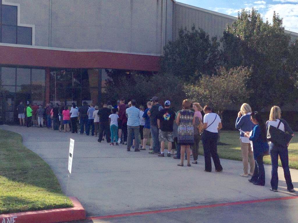 Voters lined up since 8:00 a.m. at the Champion Life Centre, in Spring, on Monday October 24th, the first day of Early Voting.