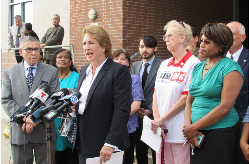 Kim Ogg gathered with supporters in July for a news conference outside the Harris County Jail. 