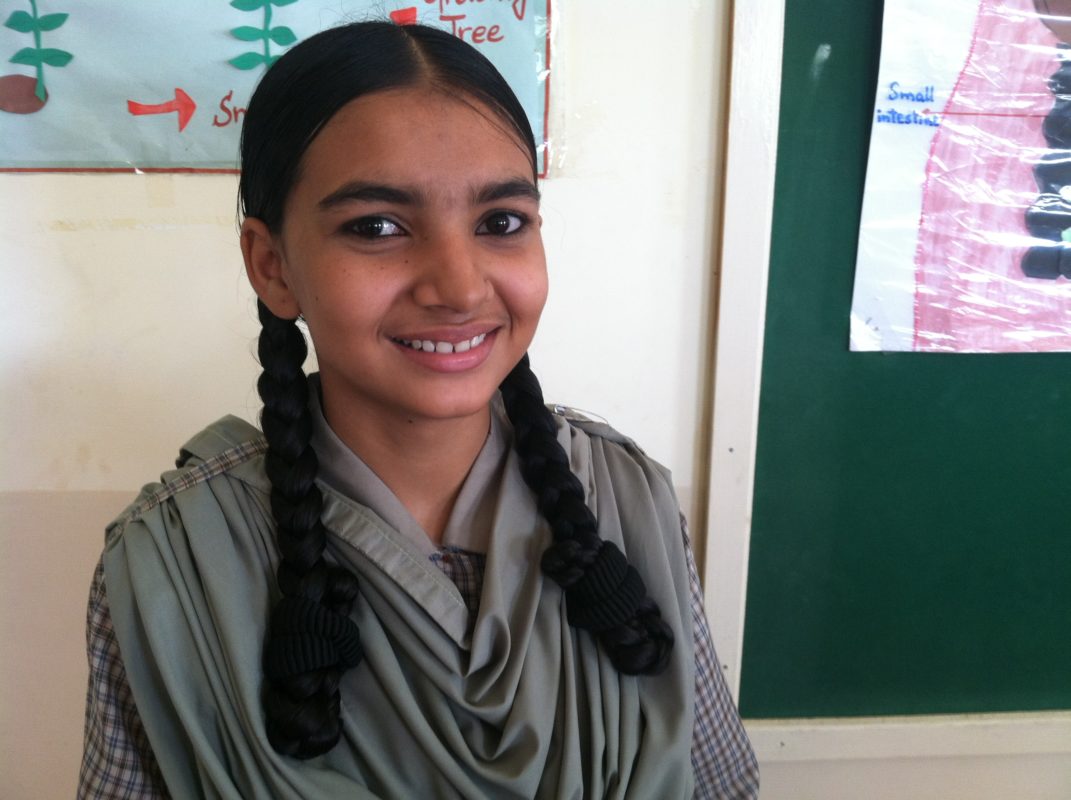 Rizwana Ruab, 16, attends the ninth grade at one of the schools with Developments in Literacy in Orangi. She is studying biology so she can become a police officer. She spends several hours every day making shoes with her family. She earns on average about 20 U.S. cents an hour.