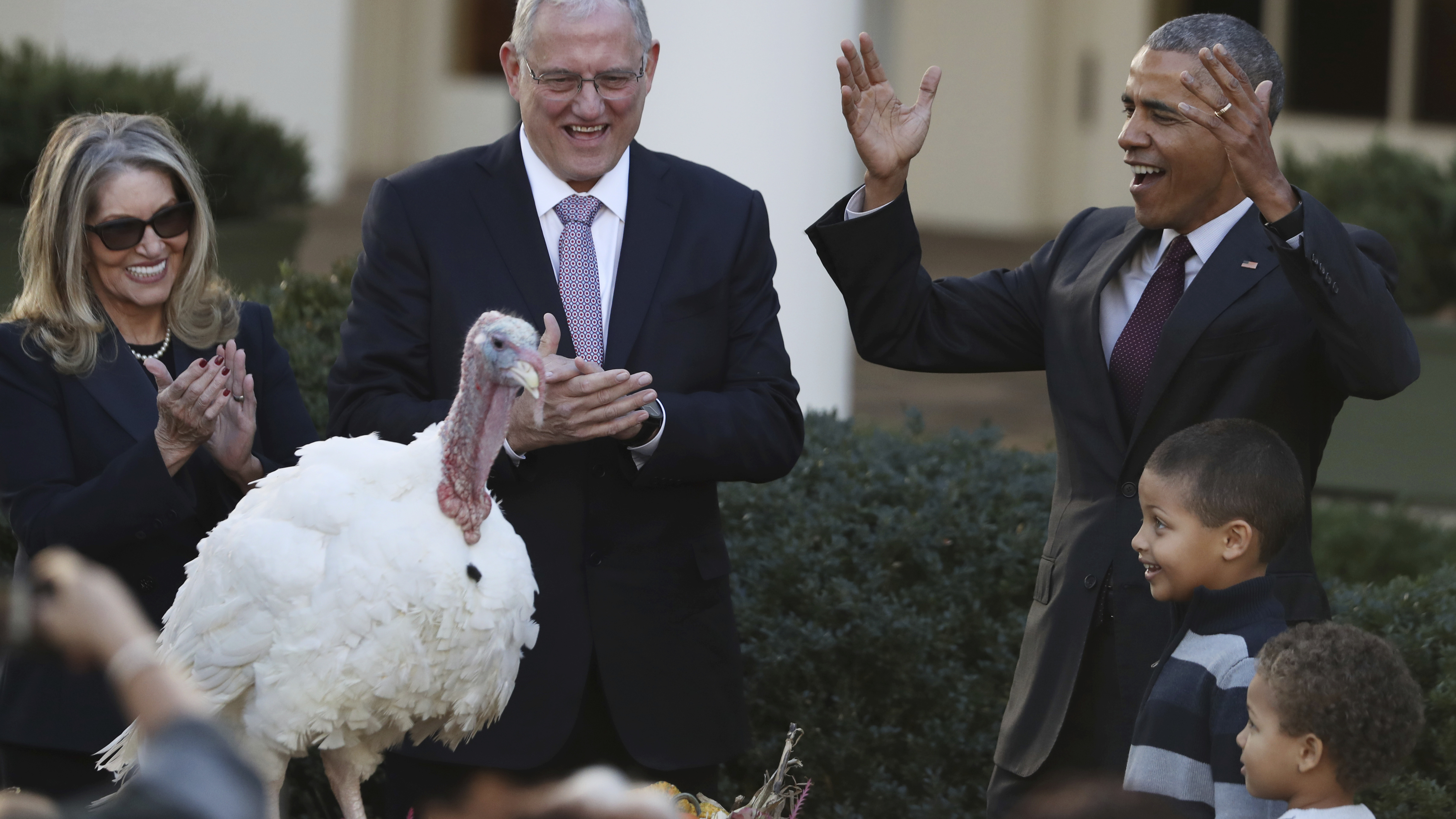 President Obama -- with his nephews Aaron Robinson and Austin Robinson, and National Turkey Federation Chairman John Reicks -- pardons Tot, the National Thanksgiving Turkey, on Wednesday.