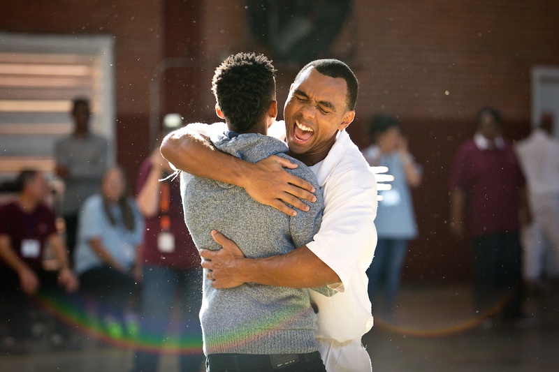 John Green reunites with his son in the middle of the Darrington Unit gym at the start of the Day with Dad program, Saturday, Nov. 5, 2016. Children and the 29 participating inmates ran into each other's arms to kick off the day of activities.  