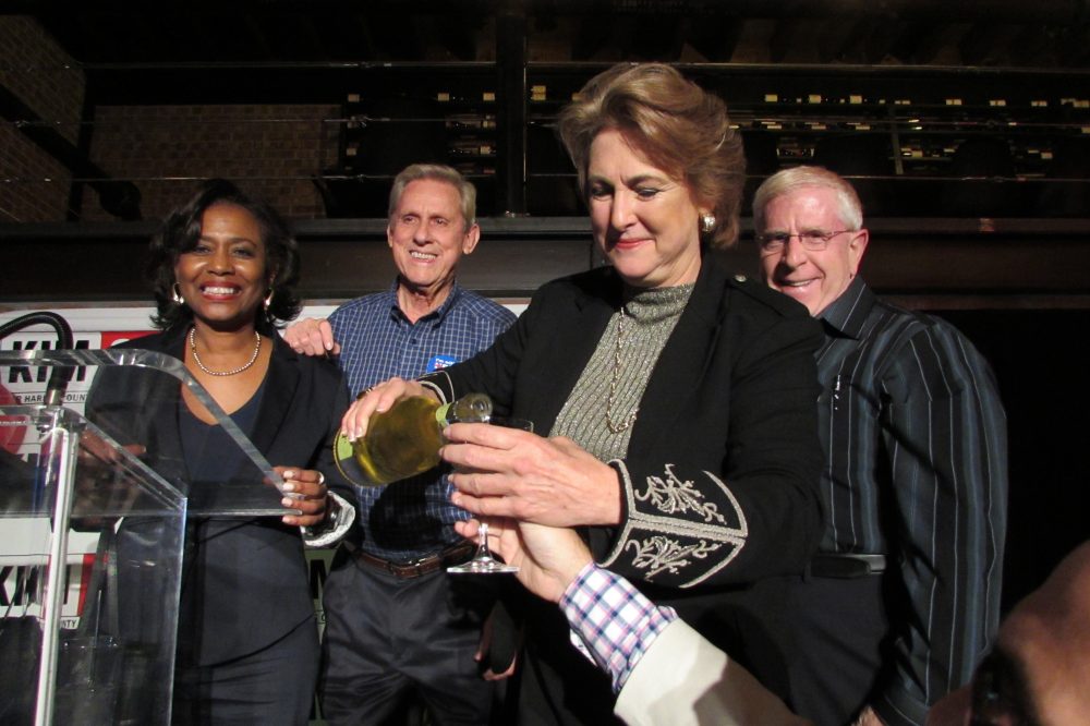 Kim Ogg has a champagne toast with supporters at her election night party in The Heights.  