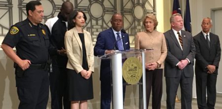 Houston Mayor Sylvester Turner (podium) and city leaders react to recent protests against President Donald Trump's orders on immigration.