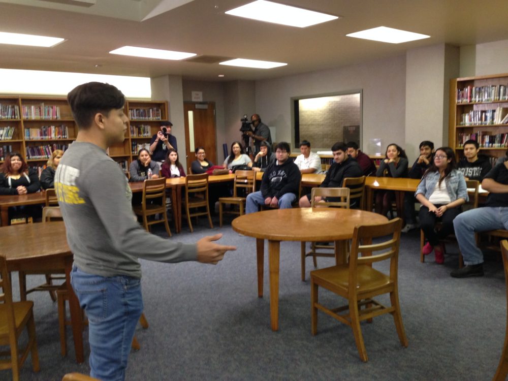 A student from HISD's Sam Houston Math, Science and Technology Center participates in a meeting held previously to the voter registration.