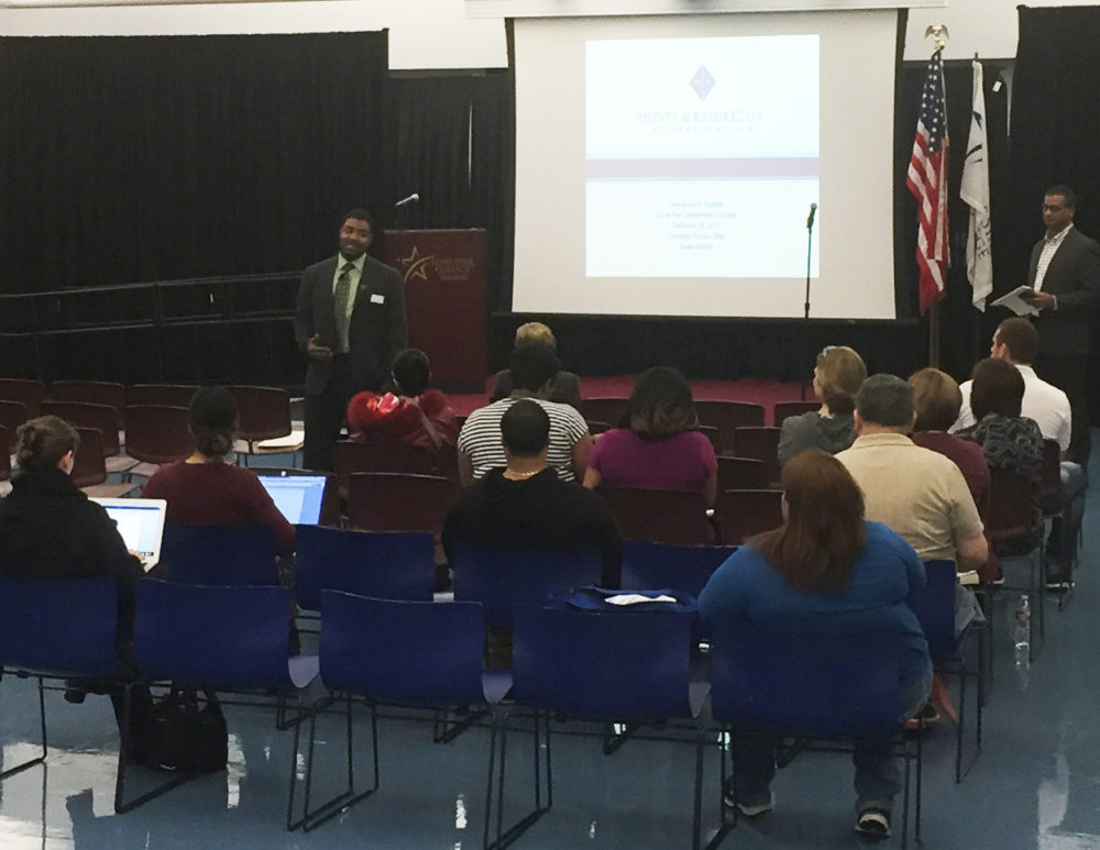Lone Star College-Tomball Vice President of Instruction Dr. Quentin Wright welcomes attendees to the first of several immigration workshops being hosted by Lone Star College this week.