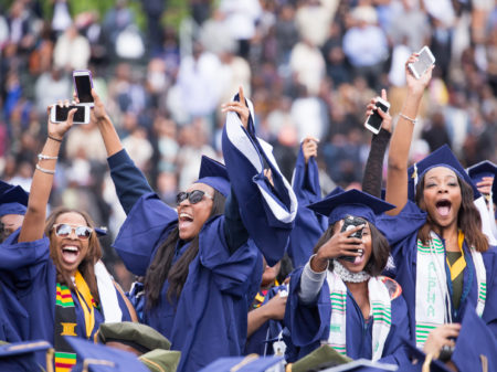 Howard University graduates celebrate at commencement in May 2016.