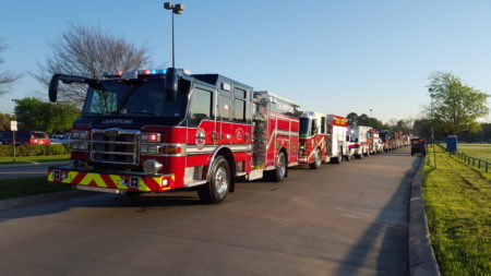 Fire trucks in line for procession March 15, 2017.
