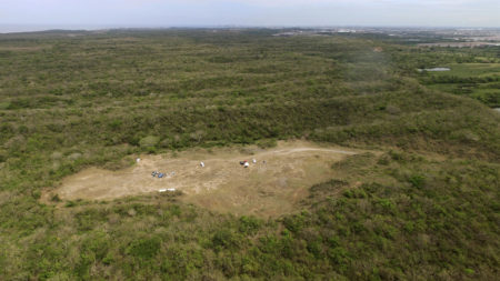 This aerial image shows the area known as Colinas de Santa Fe where Mexican authorities work to find the remains of people buried in mass graves on the outskirts of Veracruz. More than 250 skulls were found there earlier this year in what appears to be a drug cartel's mass burial ground, prosecutors said.