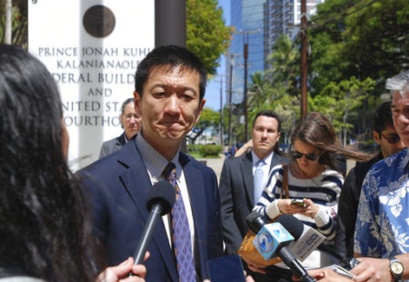 Hawaii Attorney General Douglas Chin speaks outside federal court in Honolulu, Wednesday, March 29, 2017. A federal judge in Hawaii questioned government attorneys Wednesday who urged him to narrow his order blocking President Donald Trump's travel ban because suspending the nation's refugee program has no effect on the state. U.S. District Judge Derrick Watson is hearing arguments on whether to extend his temporary order until Hawaii's lawsuit works its way through the courts. Even if he does not issue a longer-lasting hold on the ban, his temporary block would stay in place until he rules otherwise.