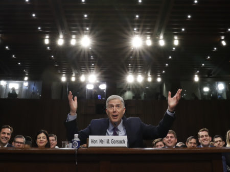 Supreme Court nominee Neil Gorsuch gestures as he speaks during his confirmation hearing before the Senate Judiciary Committee.