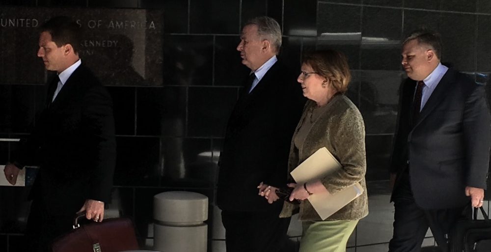 Ex-Congressman Steve Stockman (center) enters the federal courthouse in downtown Houston Wednesday for his arraignment on felony charges.