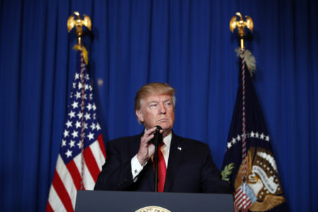 President Donald Trump speaks at Mar-a-Lago in Palm Beach, Fla., Thursday, April 6, 2017, after the U.S. fired a barrage of cruise missiles into Syria Thursday night in retaliation for this week's gruesome chemical weapons attack against civilians. (AP Photo/Alex Brandon)