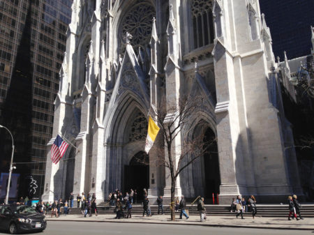 Pedestrians walk past St. Patrick's Cathedral in New York City. The number of Americans who list their church affiliation as "none" has certainly increased, but more than 70 percent still identify generally as Christian.