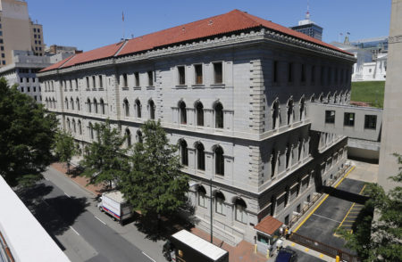 This Tuesday, May 2, 2017 photo shows the US 4th Circuit Court of Appeals building, the site of a full 15-member court hearing on President Donald Trump's revised travel ban targeting six Muslim-majority countries in Richmond, Va. (AP Photo/Steve Helber)