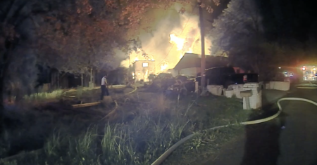 A still image from a bodycam video shows the house fire that left three children dead in North Houston on May 12th, 2017.