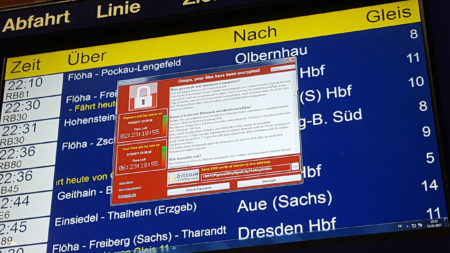 After the WannaCry cyberattack hit computer systems worldwide, Microsoft says governments should report software vulnerabilities instead of collecting them. Here, a ransom window announces the encryption of data on a transit display in eastern Germany, on Friday.